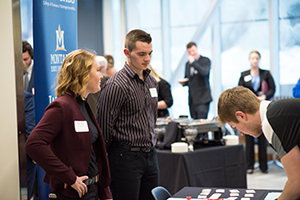 students checking in at recruiters fair