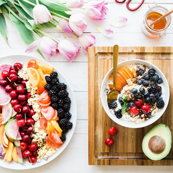 yogurt bowl with mixed berries and granola