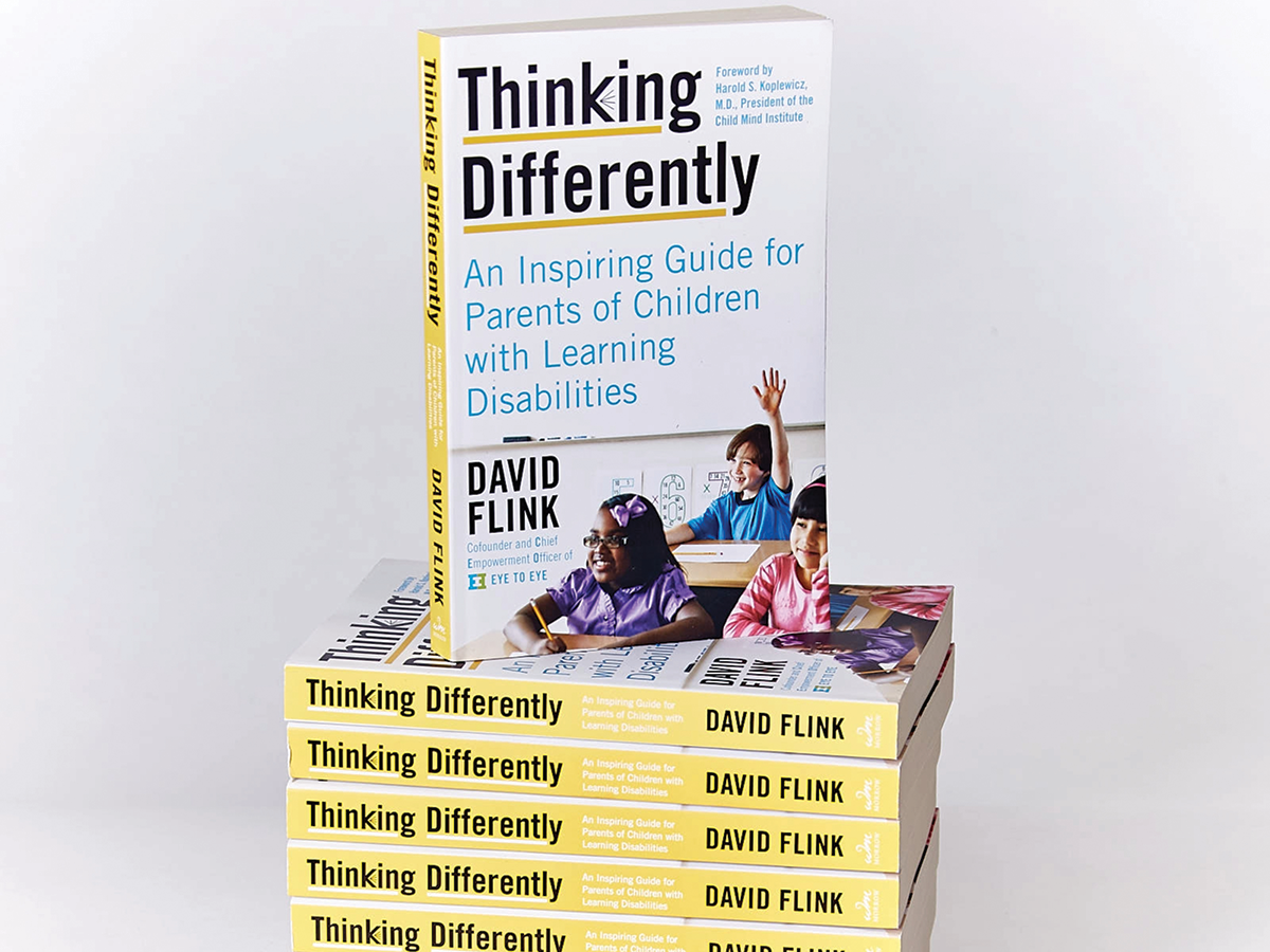 A stack of books with yellow spines, that are titled Thinking Differently