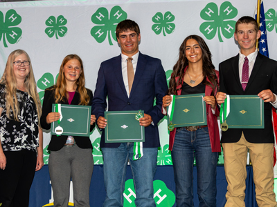 4-H members holding awards from Montana 4-H Congress