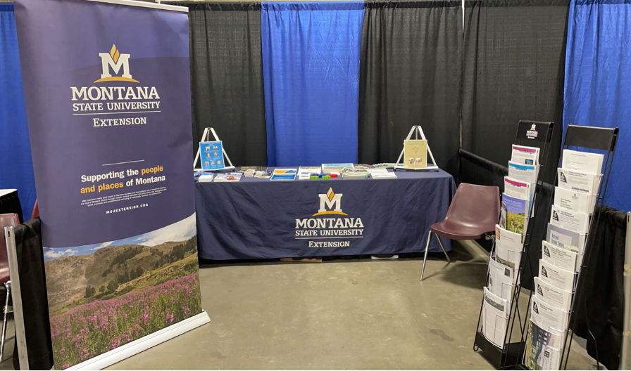 Educational display with additional resources available for producers during the Weed Management Lecture.