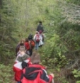 Students hike along a trail