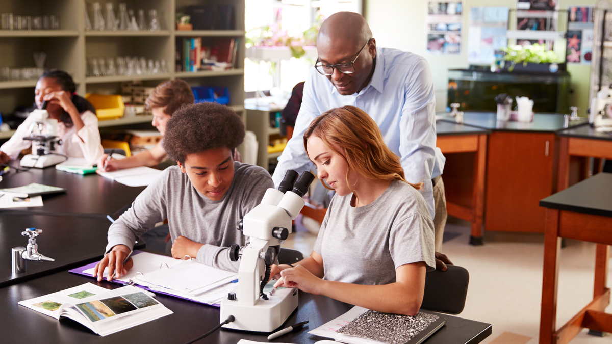 Teacher doing research with students