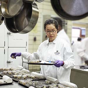 Dr. Kuo in Hannon Hall test kitchen