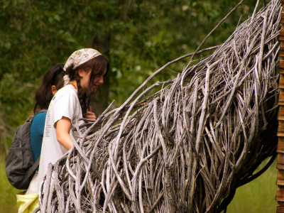 Honors College students explore "Cursive Takes a Holiday" by Patrick Dougherty.