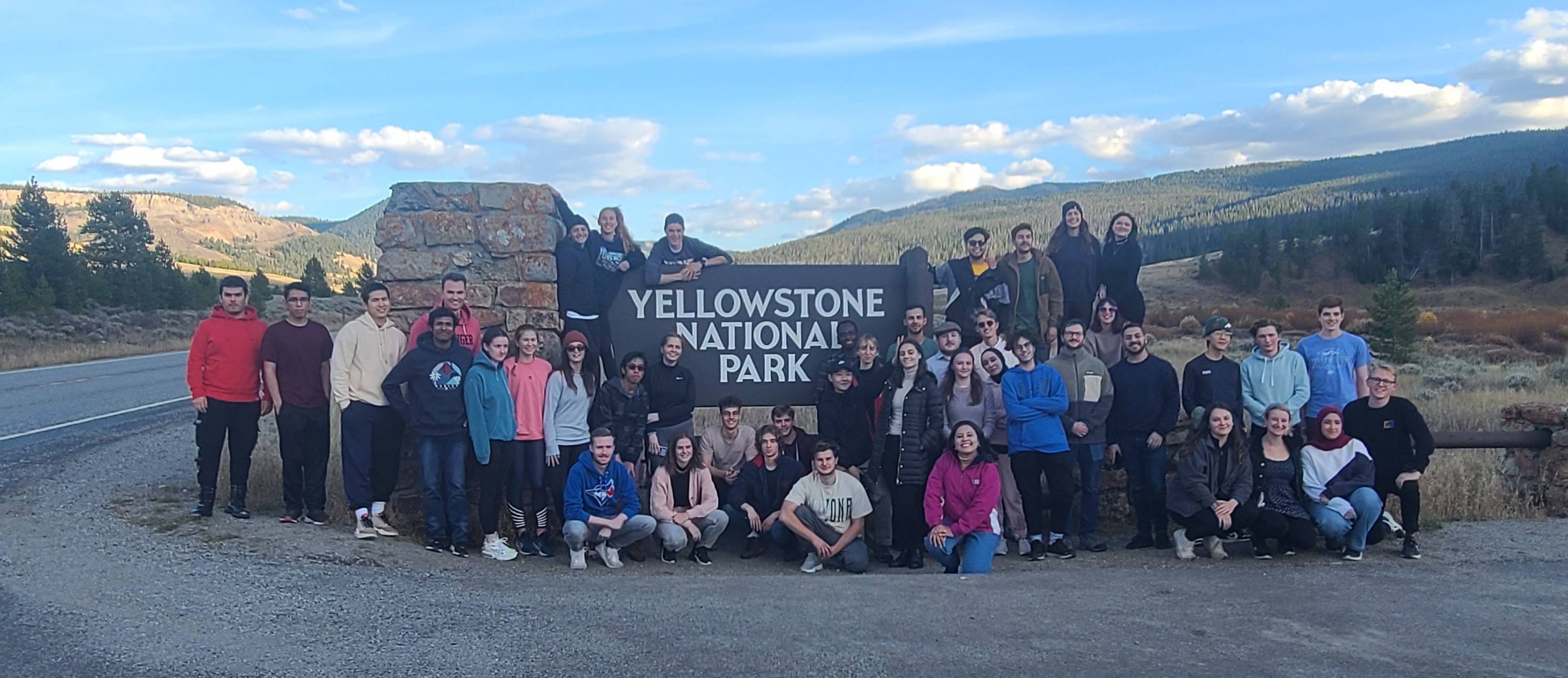 People posing for a photo at Yellowstone