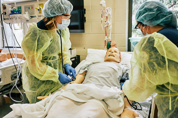 Two nurses in SIM lab